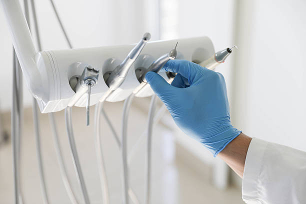 Professional Emergency Dentist technician working in Kure Beach, NC
